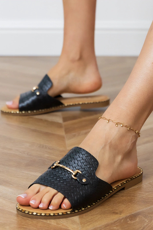 Schwarze flache Hausschuhe mit...