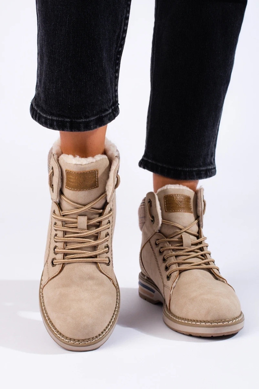 Beige isolierte Damenstiefel Beige isolierte Damenstiefel
