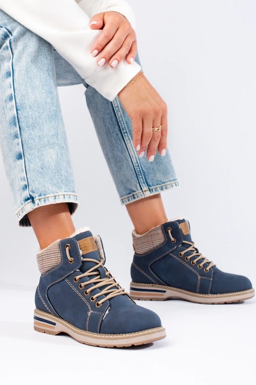 Isolierte Damenstiefel blau Isolierte Damenstiefel blau
