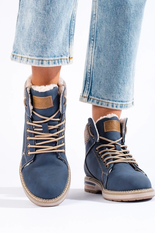 Isolierte Damenstiefel blau Isolierte Damenstiefel blau