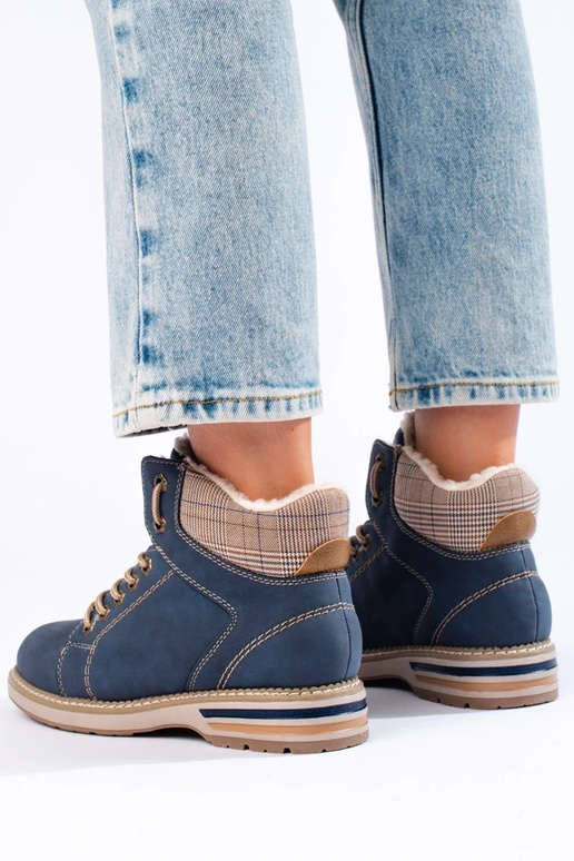 Isolierte Damenstiefel blau Isolierte Damenstiefel blau