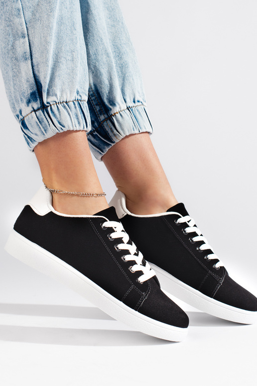 Damenschuhe aus schwarzem Wildleder Damenschuhe aus schwarzem Wildleder