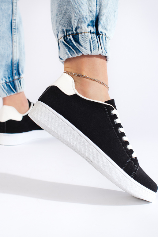 Damenschuhe aus schwarzem Wildleder Damenschuhe aus schwarzem Wildleder