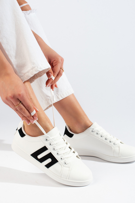 Weiß-schwarze Damenschuhe Weiß-schwarze Damenschuhe