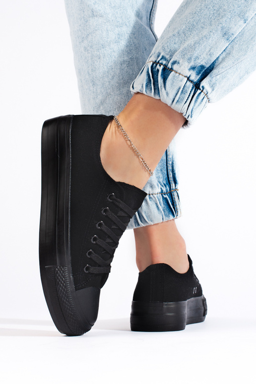 Schwarze klassische Damen-Sneakers... Schwarze klassische Damen-Sneakers...