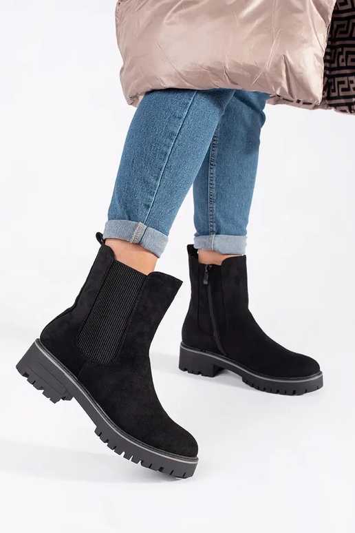 Schwarze flache Wildlederschuhe mit... Schwarze flache Wildlederschuhe mit...