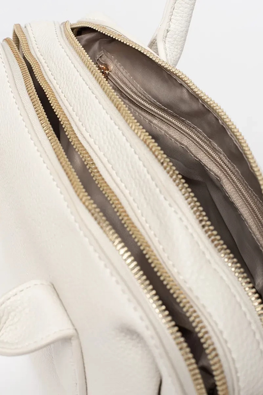 Helle sandfarbene Damenhandtasche Helle sandfarbene Damenhandtasche