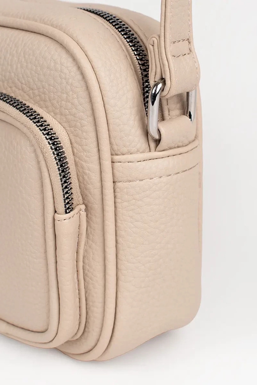 Elfenbeinfarbene kleine Handtasche...