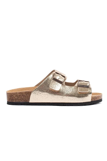 Goldene flache Sandalen