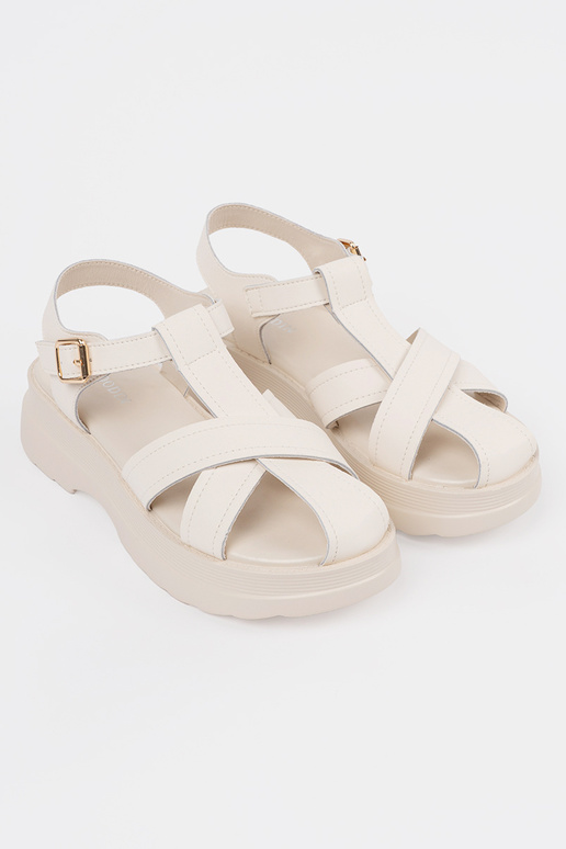 Elfenbeinfarbene Sandalen mit dicker... Elfenbeinfarbene Sandalen mit dicker...