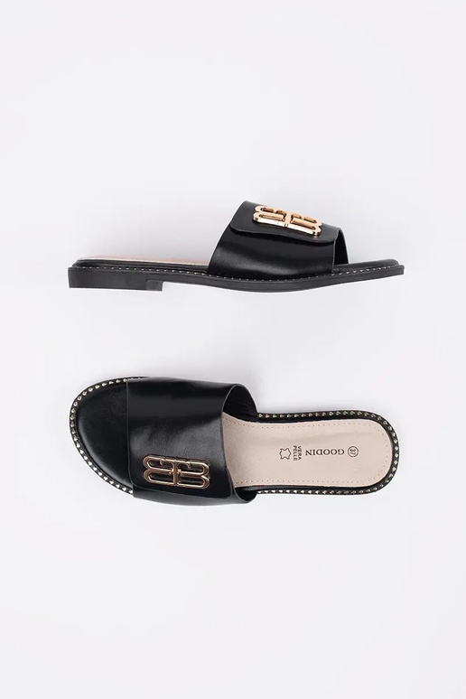 schwarze Damenflipflops mit flachem... schwarze Damenflipflops mit flachem...