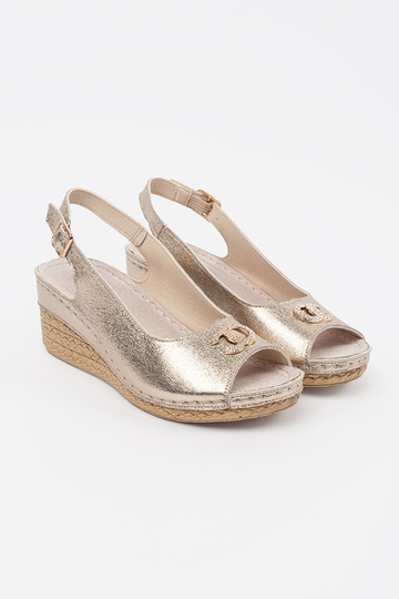 Goldfarbene Sandalen auf... 2