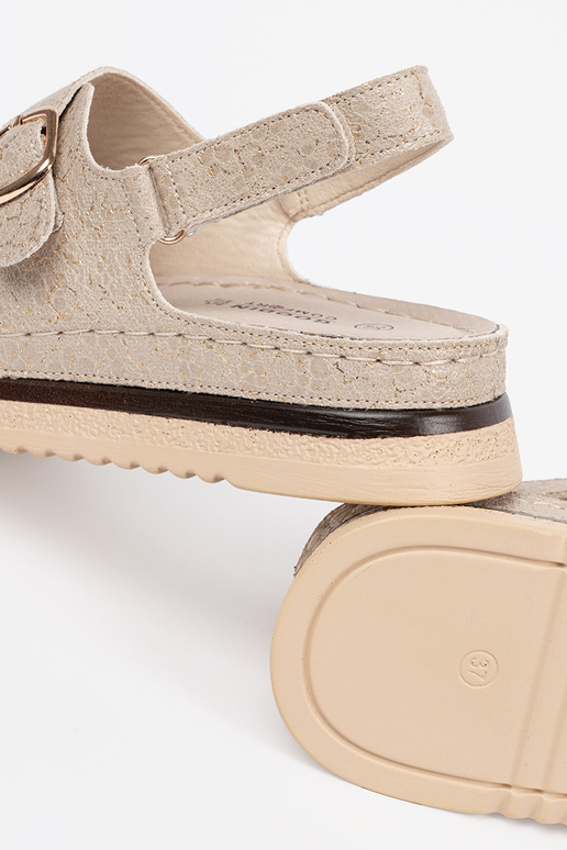 Sandfarbene Sandalen mit goldenen...