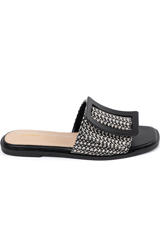 Schwarz-weiße flache Pantoletten