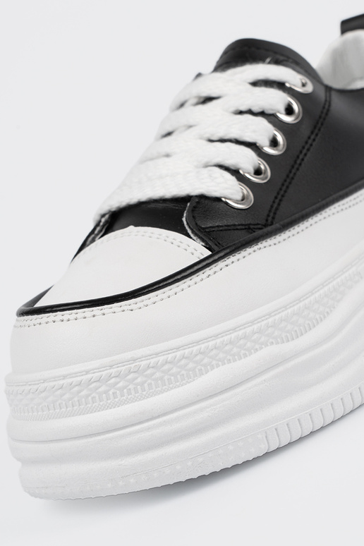 Schwarz-weiße Freizeitschuhe mit...