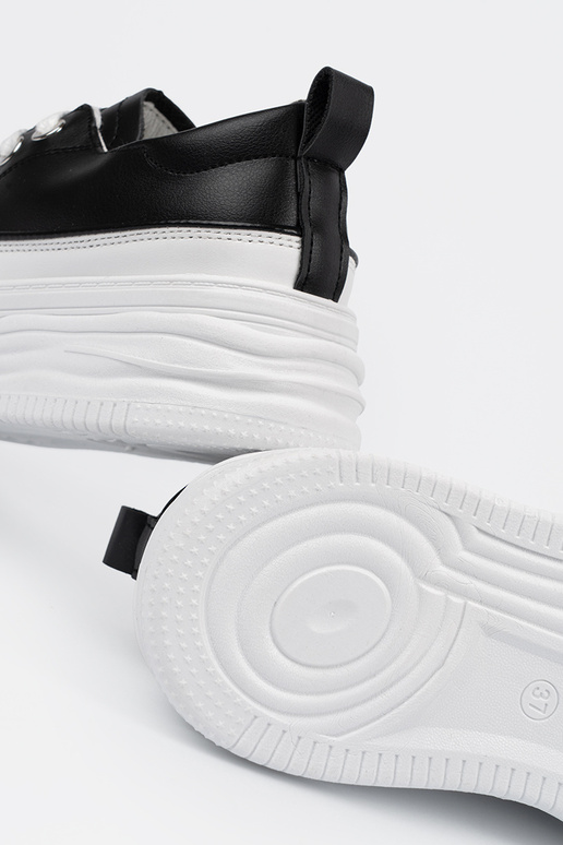 Schwarz-weiße Freizeitschuhe mit...