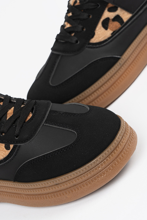 Schwarze sportliche Schuhe für Frauen...