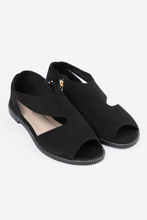 Flache, durchbrochene Sandalen in... Flache, durchbrochene Sandalen in...