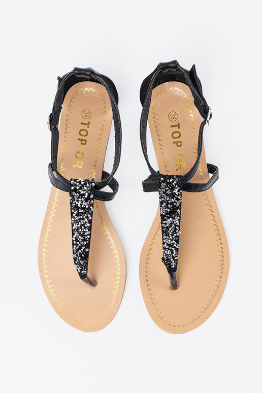 Flache schwarze Sandalen im... Flache schwarze Sandalen im...