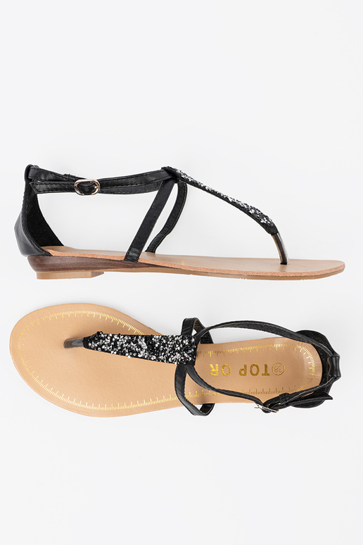 Flache schwarze Sandalen im... Flache schwarze Sandalen im...