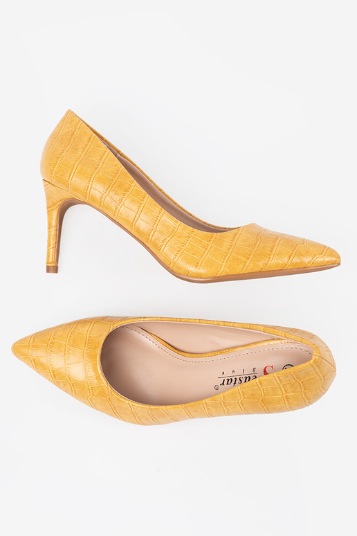 Gelbe klassische High Heels auf... Gelbe klassische High Heels auf...