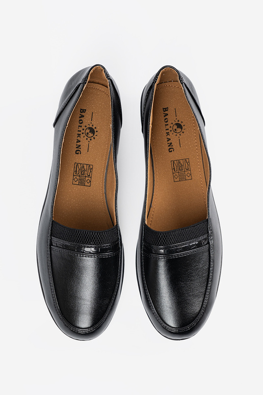 Schwarze klassische Slipper zum... Schwarze klassische Slipper zum...