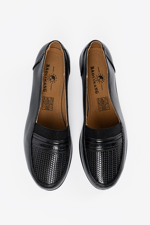 Schwarze Halbschuhe auf Plattform