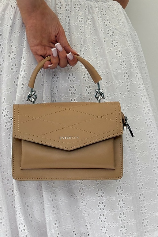 Elfenbeinfarbene kleine elegante...