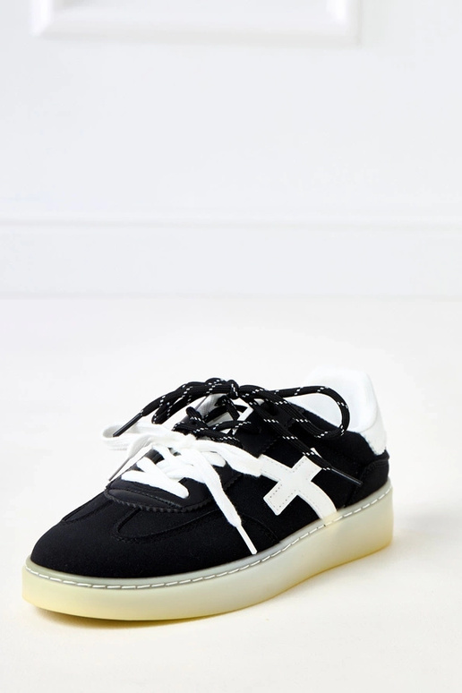 Schwarze Sneakers auf Plattform mit... Schwarze Sneakers auf Plattform mit...