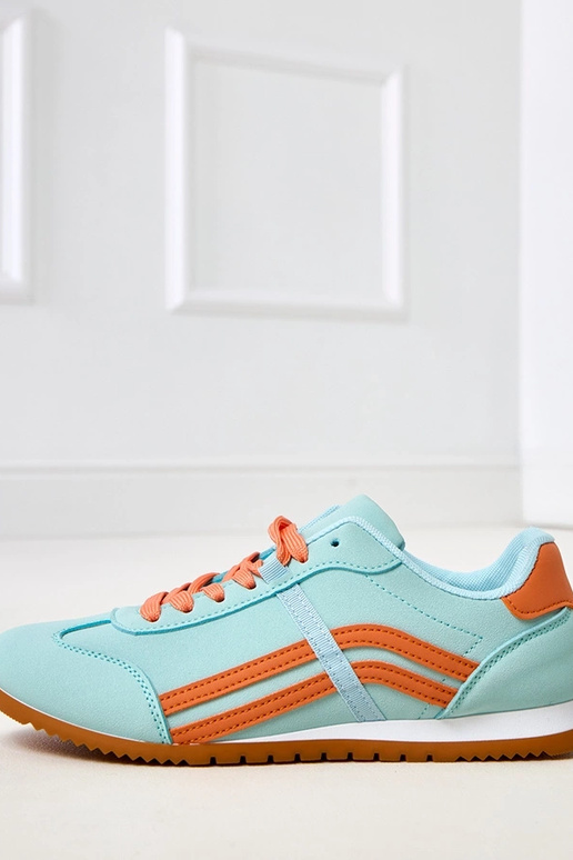 Blaue Sneakers mit orangefarbenem... Blaue Sneakers mit orangefarbenem...