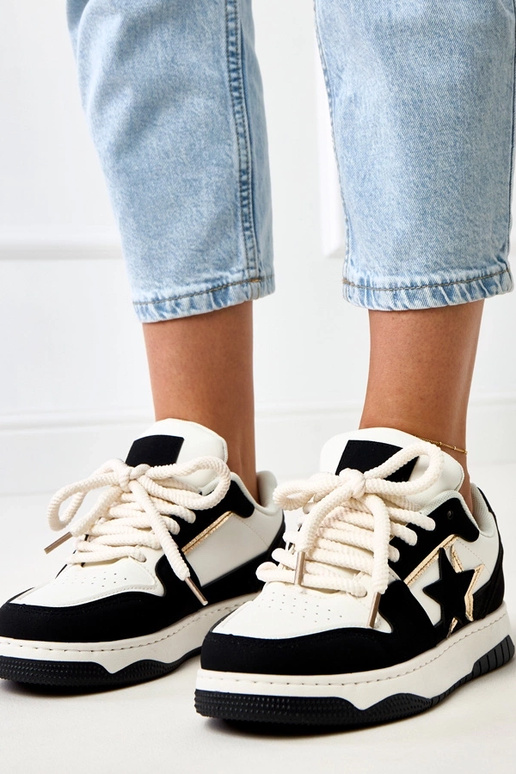 Schwarz-weiße Plattform-Sneaker mit... Schwarz-weiße Plattform-Sneaker mit...