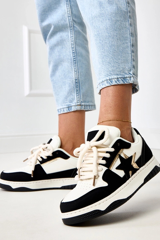 Schwarz-weiße Plattform-Sneaker mit... Schwarz-weiße Plattform-Sneaker mit...