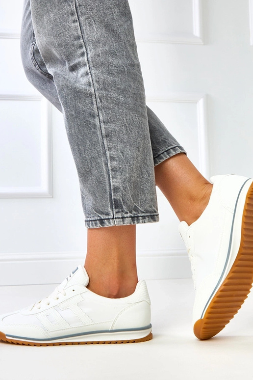 Weiße Sportschuhe mit grauen...