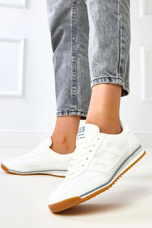 Weiße Sportschuhe mit grauen...