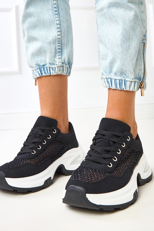 Schwarze Sneakers auf Plattform mit... Schwarze Sneakers auf Plattform mit...