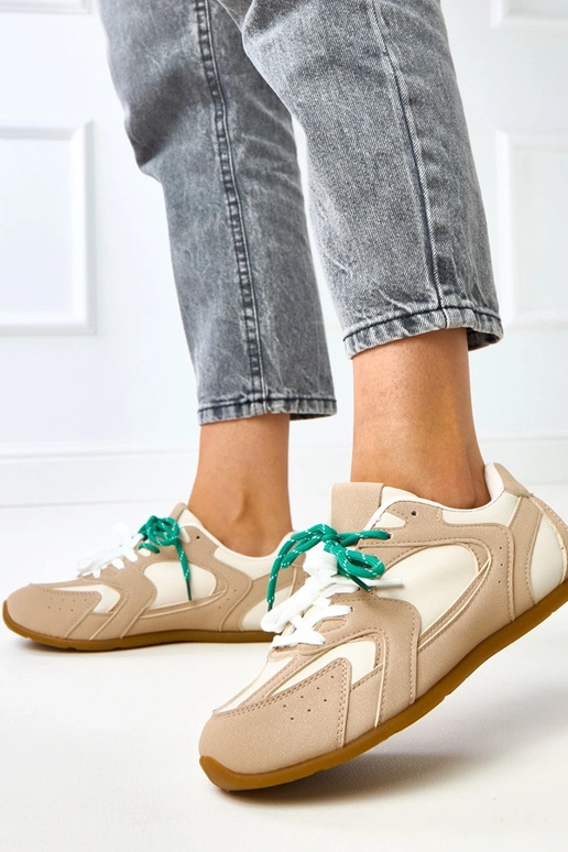 Beige Sportschuhe mit doppelten... Beige Sportschuhe mit doppelten...