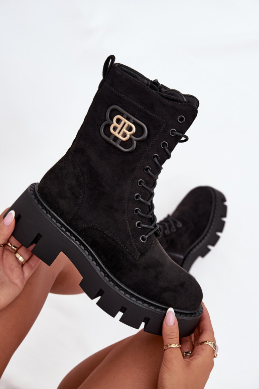 Warm gefütterte Damenstiefeletten und Noker mit Ornamenten in schwarz Melisse