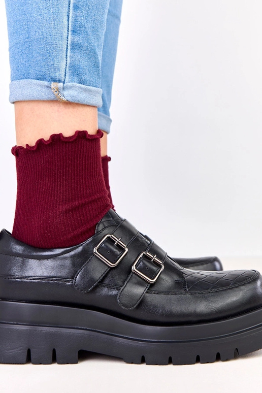 Schwarze Halbstiefel auf massiver...