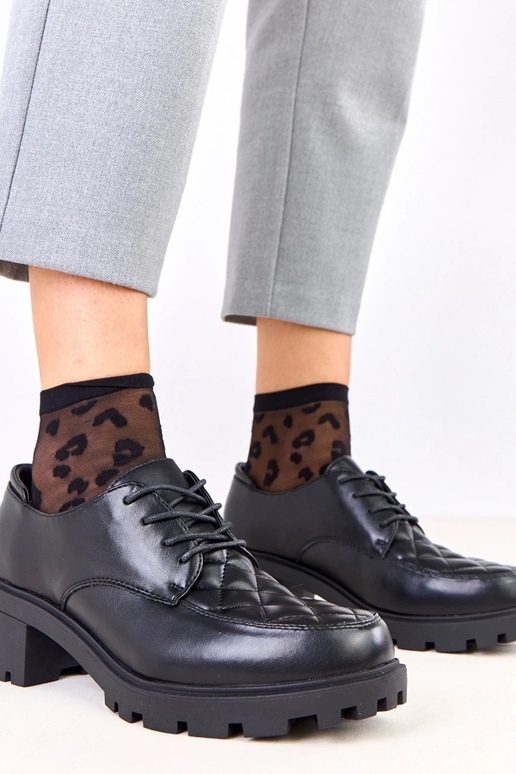 Schwarze Halbschuhe mit gestepptem...