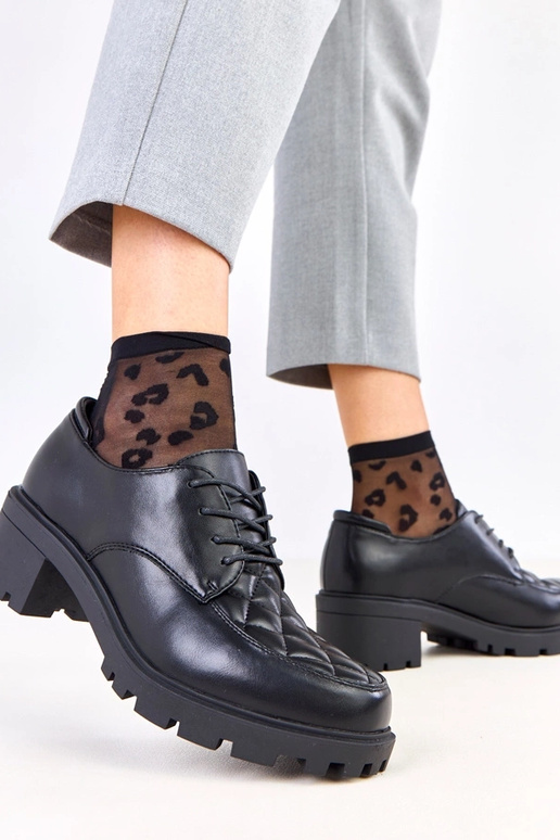 Schwarze Halbschuhe mit gestepptem...