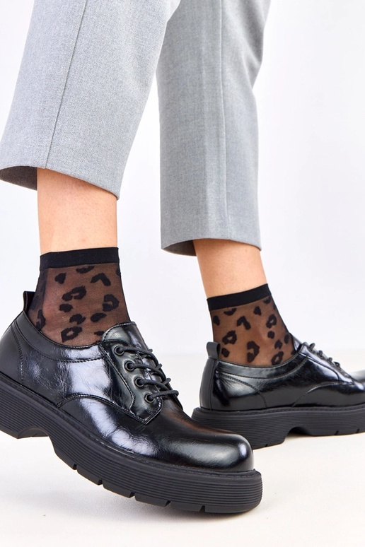 Schwarze Damenhalbschuhe auf...