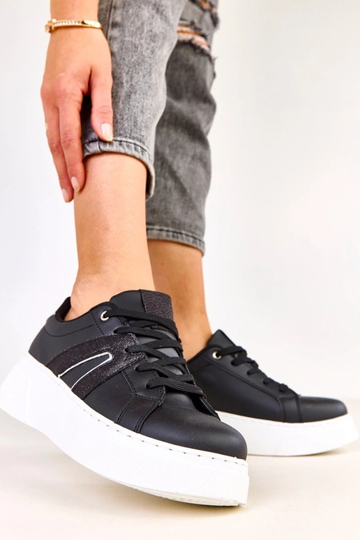 Schwarze Sneakers mit Plattform und...