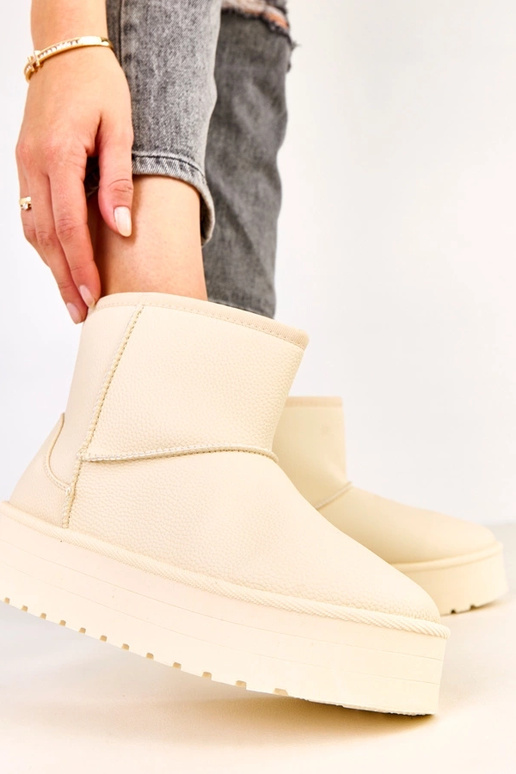 Beige niedrige Schneestiefel mit... Beige niedrige Schneestiefel mit...