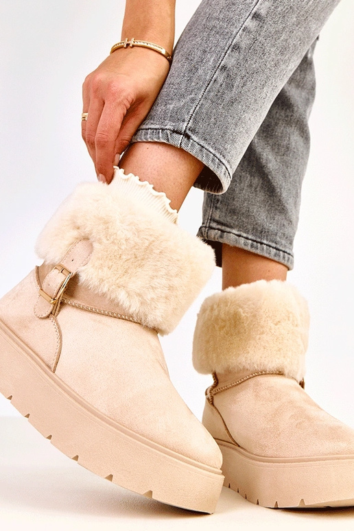 Beige Schneestiefel mit Plateausohle... Beige Schneestiefel mit Plateausohle...