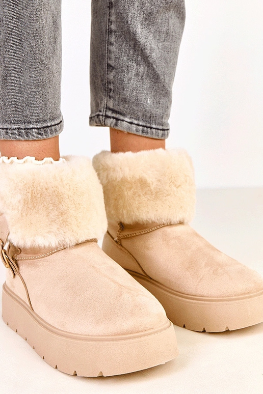 Beige Schneestiefel mit Plateausohle... Beige Schneestiefel mit Plateausohle...