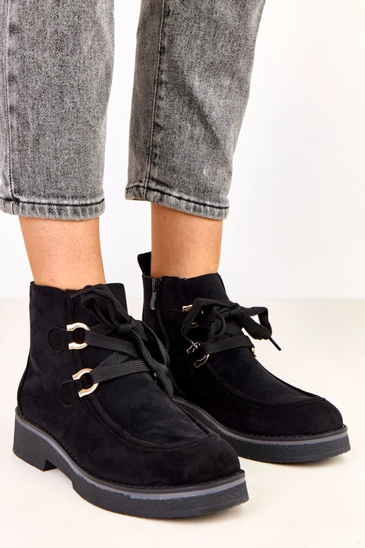 Schwarze warme Stiefel mit... Schwarze warme Stiefel mit...
