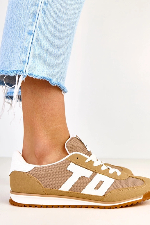 Grüne Sportschuhe mit weißen...