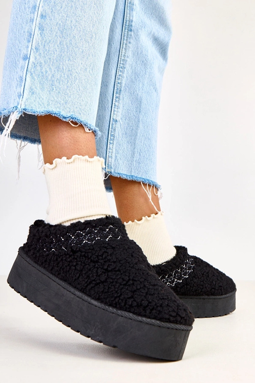 Schwarze flache Schneestiefel mit... Schwarze flache Schneestiefel mit...