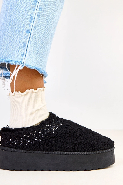 Schwarze flache Schneestiefel mit... Schwarze flache Schneestiefel mit...