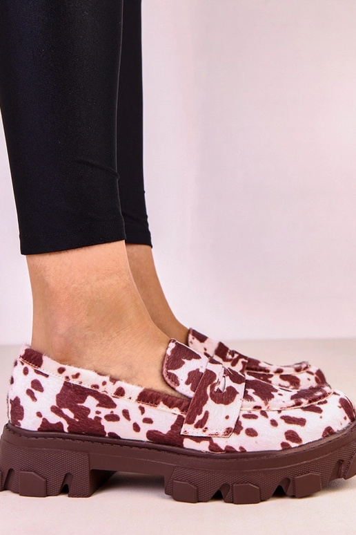 Braune Damenmokassins mit Kuhflecken...